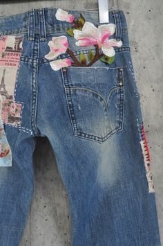 "Ready to send:Size-32,31,33,34 unique vintage jeans One of a kind.. Hand made embroidery and unique patches. ---Or---- Made to order, in any size, within 15 working days . If you need different size, please send me a message and I will make you a special and unique design within 15working days. They are all different! No one will have the same one as you have! Hand made, one of kind jeans. You pick your size, model (slim- boyfriend- high waist- low waist) and primer color and you will get your Spring Reworked Denim Blue Jeans, Spring Denim Jeans With Collage Stitching, Spring Medium Wash Reworked Jeans, Spring Reworked Medium Wash Jeans, Vintage Jeans With Pockets For Spring, Vintage Denim Blue Jeans For Summer, Vintage Cotton Jeans For Spring, Retro Faded Jeans For Spring, Spring Retro Distressed Jeans