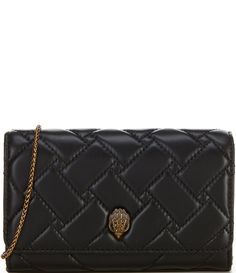 From Kurt Geiger London&#x2C; the Extra Mini Leather Quilted Wallet On Chain Crossbody Bag features:Leather exteriorPolyester liningShiny brass hardwareSnap and flap closureInterior single compartment&#x2C; 1 kindness message pocketSingle strapApprox. 7.48'' W x 5.31'' W x 1.57'' D&#x2C;  23.23'' strap dropImported. Designer Leather Wallet On Chain With Chain Strap, Designer Black Leather Wallet On Chain, Black Wallet On Chain With Gold-tone Hardware For Business, Designer Leather Wallet On Chain, Luxury Leather Wallet On Chain With Removable Pouch, Luxury Business Wallet On Chain With Chain Strap, Luxury Leather Wallet On Chain, Rectangular, Luxury Leather Wallet On Chain For Business, Luxury Leather Business Wallet On Chain