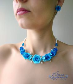 "Blue statement necklace Blue roses necklace Blue floral jewelry with polymer clay Blue wedding necklace Bridesmaids Blue flowers necklace Blue statement necklace with flowers and glass beads.  This Elegant necklace choker will be a great addition in your look, it will fulfill your womanhood and beauty. Circumference choker is about 40 cm/15.74\" + extension chain 5cm/ 1,96\" ✿ THIS NECKLACE ARE READY TO SHIP! ✿ Real colors may slightly differ from one monitor to another, as it depends on specific monitor settings. ✿ All my jewelry packed in a gift box Polymer clay flowers are quite sturdy, they are waterproof and do not change color with time. Still, I would recommend to avoid direct contact with water, as it may damage the findings. ♥ Thank you for visiting my shop.♥ *Look the other BLUE Cheap Blue Flower-shaped Jewelry, Blue Necklace With Flower Charm, Blue Handmade Flower Jewelry For Gifts, Blue Handmade Flower Jewelry As Gift, Handmade Flower Blue Jewelry As Gift, Handmade Blue Flower Jewelry For Gifts, Turquoise Flower-shaped Jewelry For Wedding, Turquoise Flower Jewelry For Wedding, Turquoise Flower-shaped Wedding Jewelry