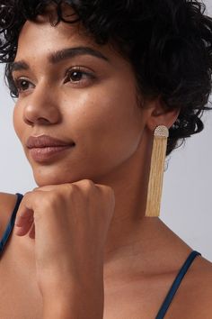 Dazzle all night long with these Aeris tassel drop earrings! These shimmering tassel drop earrings make a statement at any party, leaving you shining like a star! Way more than just minimalist chic, these earrings are water-proof and tarnish-proof. Make a statement without saying a word - these earrings were made for luxury. ………………………………….D E T A I L S• Materials: Stainless steel, 18k gold plating, cubic zirconia• Length: 7cm (2.7 inches)• Width: 1.7cm (0.7 inches)• Weight: 14g/pair• This produc Luxury Drop Linear Earrings For Party, Luxury Linear Drop Earrings For Party, Luxury Linear Earrings For Party, Elegant Evening Tassel Drop Earrings, Elegant Long Drop Chandelier Earrings With Tassels, Elegant Long Drop Tassel Chandelier Earrings, Gold Tassel Earrings With Rhinestone Fringe, Modern Tassel Drop Earrings For Party, Glamorous Tassel Drop Earrings