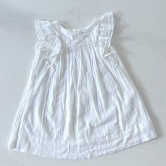 So Sad We Never Got To Wear This! My Youngest Daughter Grew Out Of The Size Before We Could Use It. Very Soft Cotton And Viscose Blend With A Gauzy Look. Intricate Embroidered Detail And Fabric Covered Buttons. Smoke Free, Pet Friendly Home. Cotton Ruffle Sleeve Dress For Dress-up, Cotton Ruffle Sleeve Dress, Cotton Dress With Ruffle Sleeves For Dress-up, Cotton Flutter Sleeve Dress For Playdate, White Flutter Sleeve Dress For Playdate, White Flutter Sleeve Playtime Dress, Lauren Young, Girls Blazers, Pink Pleated Dress