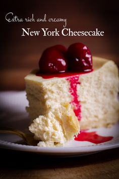 a piece of cheesecake with cherries on top and the words new york cheesecake