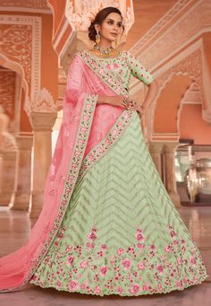 Pista green georgette a line lehenga choli 8512  Desc:  Style : A Line Lehenga Choli Color : Pista Green Fabric : Georgette Work : Embroidery Wash Care : Dry clean Sleeve Style : Half Sleeve Long Sleeves : Done only in Custom Stitch Sleeves Lining : Done only in Custom Stitch Bust Size : 32 to 42 Inches Occasion : Wedding   Mehendi   Sangeet   Engagement   Reception   Ceremonial   Baby Shower. With Express Free Shipping and Custom Stitching, Buy Special Lehenga Party wedding wear dresses Pista g Simple Choli, Banarasi Skirt, Saree Bridesmaid, Green Cape, Bridal Lehenga Online, Pista Green, Party Wear Lehenga Choli, Lengha Choli, Lehenga Wedding