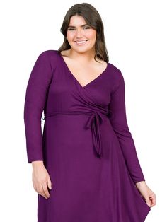 This long-sleeve plus size dress hits just above the knee and features a classic wrap-style closure and construction, a V-neck, and a tie closure along the waist to enhance a feminine silhouette. Perfect for a wedding guest or a night out.material: 92% poly, 8% spandexmodel height: 5'10.5" Solid Color V-neck Wrap Dress For Fall, Long Sleeve Wrap Dress With Tie Waist For Fall, Fall Wrap Dress With Tie Waist And Long Sleeves, Fall Mini Dress With Tie Waist And Surplice Neckline, Chic Solid Color Long Sleeve Wrap Dress, Long Sleeve Solid Color Wrap Dress For Fall, Long Sleeve Faux Wrap Dress For Fall, Faux Wrap Long Sleeve Dress For Fall, Fall Long Sleeve Solid Wrap Dress