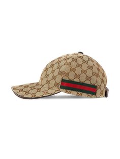 Ever wanted a cap that effortlessly mixes style with a laid-back vibe? This piece might just be your match, blending classic tones with a touch of luxury. Perfect for those who appreciate understated elegance with a hint of flair. Crafted in beige and ebony original GG fabric Features iconic green and red web detailing Trimmed with brown leather for a refined finish Adjustable hook-and-loop strap for a perfect fit Made in Italy Composition: 68% polyester, 16% cotton, 16% polyamide | Gucci Men's Sac Louis Vuitton, Louis Vuitton Sneakers, Web Detail, Gucci Store, Gucci Hat, Base Ball, Black Baseball Cap, Baseball Caps Mens, Gucci Black