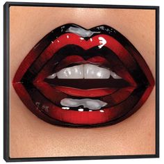 a woman's lips are painted red and black