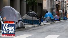 several tents set up on the side of a street