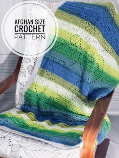 the afghan size crochet pattern is shown in green, blue and yellow stripes