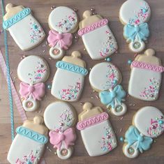 decorated cookies are displayed on a table