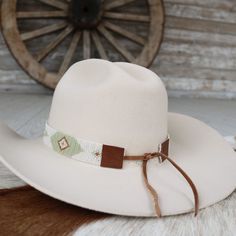 1 Unit   Glass beads  Adjustable Leather Ties  Handmade in India  Width: 1 1/8"  *Hat not included* Adjustable Beaded White Hat Bands, Adjustable Beaded White Hat, Beaded Hat Bands, Beaded Hat, Subtle Luxury, Scarf Belt, Magnolia Pearl, Hat Band, Accessories Necklace