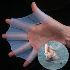 an image of someones hand holding something in the water with it's thumb out