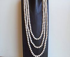 Material : Genuine Freshwater Pearl Length : 90 inches ready to wear necklaces, handknotted Shape : Potato Bead Size: 8 to 8.5 mm Color : Natural White Shipping : FREE DOMESTIC SHIPPING via USPS First Class Package within U.S. We ship all orders within 24 hours from the U.S. (We closed on Saturday and Sunday) COUPON DISCOUNTS : QUALITYBEAD05008 ---- 8% Discount with Purchase at : $50 - $99 QUALITYBEAD10010 ---- 10% Discount with Purchase at : $100 - $149 QUALITYBEAD15012 ---- 12% Discount with P Pearl Necklace Bridal, Long Pearl Necklace, Bridal Pearl Necklace, Pearl Necklace Wedding, Long Pearl Necklaces, Necklace Bridal, Wear Necklaces, Necklace Wedding, Necklace Long