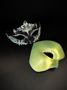 The women's mask is a black rhinestone mask with green glitter and the men's is a phantom mask in green. Mask Concept, Mardi Gras Kid, Kids Party Packs, Phantom Mask, Couples Masquerade Masks, Green Mask, Metal Mask, Female Mask, Masquerade Masks