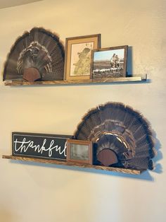 two wooden shelves with pictures on them, one has a turkey and the other has a thank you sign