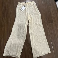 Zara Studio Transparent Beige Pants Sheer Beige Bottoms For Spring, Sheer Beige Bottoms For Summer, Sheer Trousers Bottoms For Spring, Sheer Trousers For Spring, Stretch Cream Summer Pants, Summer Stretch Cream Pants, Spring High Waist Sheer Pants, Chic Sheer White Bottoms, Stretch Cream Pants For Summer