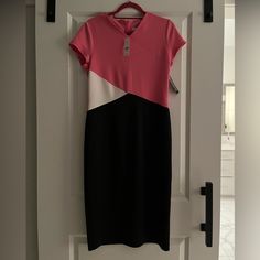 Size Medium. Pink, Black, White Color Block. Pink Short Sleeve Stretch Midi Dress, Pink Stretch Midi Dress For Work, Pink Short Sleeve Midi Dress For Work, Tie Neck Halter Dress, Green Cotton Dress, Blue Floral Print Dress, White Bow Tie, Flowy Midi Dress, Purple Floral Dress