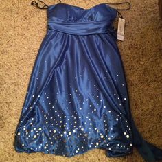 Royal Blue Homecoming Dress. Spaghetti Strap. Silver Dot Details At Bottom. Never Need Worn. Blue Fitted Strapless Dress For Homecoming, Blue Spaghetti Strap Dress For Casual Wear, Blue Spaghetti Strap Casual Dress, Blue Strapless Dress For Homecoming Prom Season, Blue Strapless Dress For Party Season, Blue Strapless Dress With Sweetheart Neckline For Prom, Blue Fitted Strapless Dress For Prom Season, Blue Strapless Dress For Party Season Night Out, Blue Strapless Sweetheart Neckline Dress For Night Out