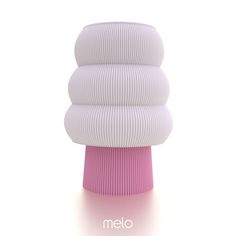 a pink and white object with the word melo on it's bottom corner