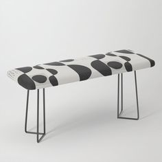 a bench with black and white polka dots on it