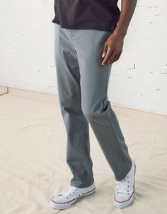 RSQ Slim Straight Chinos. Formerly known as the "New York Slim Straight Chino Pants". Features a RSQ label on back. Slant hand pockets. Welt back pockets. Slim, straight leg fit. Comfortable 4-way stretch. Approx. outseam: 42". Approx. inseam: 31.5". Approx leg opening: 15". 97% cotton/3% spandex. Machine wash. Imported. Stretch Straight Pants With Button Closure, Stretch Pants With Button Closure For Summer, Casual Wide Leg Dress Pants With Button Closure, Casual Wide-leg Dress Pants With Button Closure, Stretch Ankle-length Pants With Button Closure, Casual Full Length Summer Chinos, Casual Trousers Dress Pants With Belt Loops, Casual Summer Full Length Chinos, Summer Casual Full Length Chinos