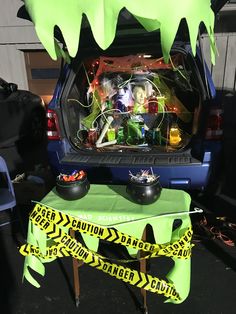 the trunk of a car is decorated with halloween decorations