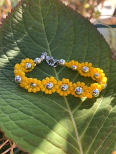 Very cute sunflower bracelet ! Made with lots of love Sunflower Beaded Bracelet, Sunflower Bracelet, Cute Sunflower, Red Bank, Lots Of Love, Beaded Bracelet, Favorite Jewelry, Of Love, Sunflower