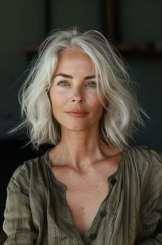 Embrace a chic and voluminous look with a stacked bob featuring soft layers. Perfect for women over 50, this hairstyle provides a beautiful blend of style and softness, framing the face delicately. Click here to explore more stylish and age-appropriate hairstyles. Stacked Bob, Soft Layers