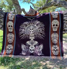 These one of a kind handmade hooded ponchos are made with the highest quality materials. The stylish design of the Aztec calendar in front and on the back is sure to catch anyone's attention. These ponchos are also reversible so you can wear them on both sides. The ponchos are lightweight yet warm perfect for cold nights, camping, music festivals, or any cold day of the year. Dimensions: Length: 5 feet 10 inches (including fringes) Width: 3 feet 10 inches One size fits most WASHING INSTRUCTIONS Hippie Hooded Poncho For Festivals, Bohemian Hooded Cape For Festivals, Bohemian Hooded Poncho One Size, Hippie Shawl Poncho For Festivals, One Size Bohemian Cape For Festivals, Bohemian One-size Festival Cape, Bohemian One-size Cape For Festivals, Bohemian Multicolor Hooded Cape, Multicolor Bohemian Hooded Cape