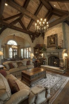 a living room with couches, chairs and a fire place in the middle of it