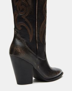 A Western boot is a requirement for any wardrobe and we’re obsessed with LASSO. This knee-high pair features whipstitching detail and a towering block heel. 3.75 inch heel height Size 6 measurements: 17 inch shaft circumference, 13.5 inch shaft height Size 8 measurements: 18 inch shaft circumference, 14.25 inch shaft height Size 10 measurements: 19 inch shaft circumference, 15 inch shaft height Leather upper material Textile and synthetic lining Synthetic sock Synthetic sole Imported Western Boots Women, Western Boot, Wide Calf, Western Boots, Women's Boots, Knee High, Block Heels, Heel Height, Leather Upper