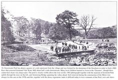 an old black and white photo of people walking in the park