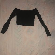 Super Adorable Off The Shoulder Top. Never Worn. It Will Fit A Medium Or A Small Casual Black Stretch Crop Top, Fitted Casual Black Crop Top, Basic Black Stretch Crop Top, Black Stretch Basic Crop Top, Black Cropped Top For Night Out, Basic Black Tops For Fall, Black Stretch Crop Top For Fall, Casual Black Crop Top For Night Out, Casual Black Long Sleeve Crop Top