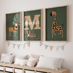 three framed pictures hang on the wall above a wooden bench with pillows and pillow cases