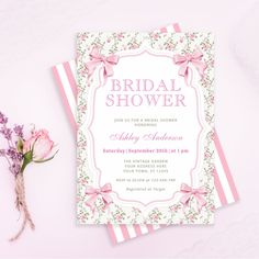 a pink and white bridal shower with flowers