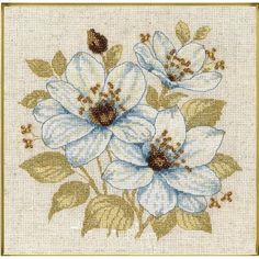 a cross stitch pattern with white flowers on it