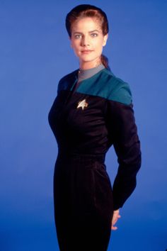 a woman in a star trek uniform with the caption i want you to join the star trek team