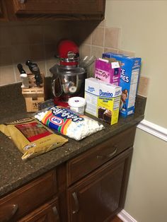 the kitchen counter is cluttered with items for baking