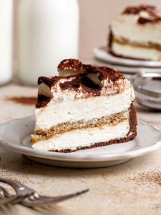 a piece of cake sitting on top of a white plate