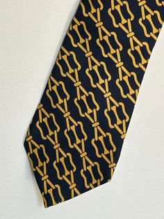 Vintage Loewe brand silk necktie, made in Spain, 100%silk  Vintage but never been worn Loewe classic silk tie Abstract chain-like pattern Arte Iberico tie Navy blue with yellow chain-like pattern Silk Necktie, Tie Accessories, Suit And Tie, Silk Ties, Neck Tie, Madrid, Navy Blue, Gift Card, Silk