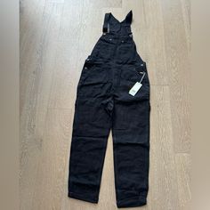 These Cute Overalls From H&M Feature Side Pockets And A Black Wash With A More Traditional Look. New With Tags Size Medium Black Relaxed Fit Overalls For Work, Black Cotton Overalls Jeans, Casual Black Straight Leg Overalls, Black Cotton Overalls, Black Overalls For Spring, Black Spring Overalls, Fitted Black Overall Jeans, Black Fitted Overalls Jeans, Black Overalls For Workwear