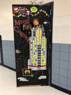 a door decorated to look like a christmas city