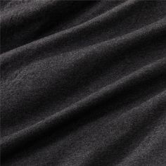 dark grey fabric textured with white stitching