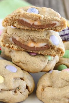 several cookies stacked on top of each other with candy and candies in the middle