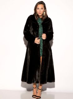 This natural ranch mink fur 7/8 coat is made with the very finest SAGA mink fur. It has side pockets and is fully lined. It features hook and eye snap closures and decorative buttons down the front. It has a mock neck collar. This gorgeous mink fur coat is one of a kind and won't last long! *This style is custom-made, please allow approximately 2-6 weeks for delivery. For questions or rush orders, please use our chat or call 334-277-7610. Length: 47 inches Fur Origin: Denmark Made in Greece SKU: Mink Fur Coat, Hook And Eye, Decorative Buttons, Mink Fur, Neck Collar, Mock Neck, Denmark, Rush, Fur Coat