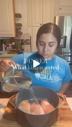 a woman pouring something into a pot on the kitchen counter