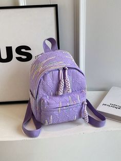 This Stylish Striped Nylon Backpack is the perfect accessory for shopping, travel, and casual outings. It's made from durable nylon and features a trendy striped design, making it both fashionable and functional. Stay organized with its multiple compartments and travel with ease thanks to its lightweight construction. Features : Lightweight, Foldable, High-capacity, Multi-function Color : Purple Pattern Type : Letter, Plaid, Plants Material : Polyamide Type : Classic Backpack Style : Casual, Cute, Preppy, Sporty, Vacation, Funky Closure Type : Zipper Bag Size : Mini Composition : 100% Polyamide Purple Nylon Student Backpack, Summer Backpack With Zipper Closure For Students, Summer Student Backpack With Zipper Closure, Student Summer Backpack With Zipper Closure, Casual Purple Nylon Backpack, Purple Nylon Backpack For Back To School, Spring Travel Nylon Backpack, Back To School Purple Nylon Backpack, Spring Nylon Backpack