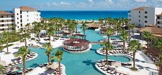 an aerial view of the pool and beach at dreams resort in cancuce, mexico