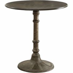 the pedestal table is made out of wood and metal