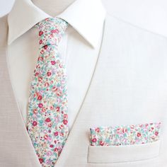 "Dapper Men's Bouquet In Blossom Necktie Made By The Belle And The Beau! Our dapper, modern, stylish, and charming neckties are perfect for everyday, Sunday best, all special occasions, photography sessions, and especially dapper on grooms and groomsmen! They are the perfect wedding accessory. We use the best cotton and cotton blend fabrics. We love that cotton is so versatile to dress up or down for any occasion. Each tie is fully lined and professionally sewn. Our men's ties come in 2 length a Grooms And Groomsmen, Man Bouquet, Floral Necktie, Suit Tie, Wedding Accessory, Wedding Order, Mens Bow Ties, Mens Neck Ties, Large Weddings