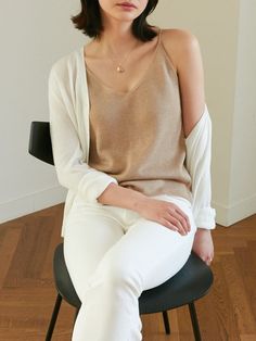 Sleeveless linen knit tank, perfectly worn in shirt with high quality stitching. Feels soft to the touch and is perfect for summer. Model is wearing MINUSEY ONE SIZE. Please allow 5-12 days shipping when in restocking.* MINUSEY ONE SIZE = EU 34-38, US 2-6* 60% Linen / 20% Rayon / 20% Acrylic* Dry clean* Made in Korea - Model Height: 171cm/5'7" (US 2, EU 34) Casual Everyday Seamless Camisole, Casual Seamless Camisole For Everyday, Summer Seamless Comfortable Tank Top, Seamless Comfortable Summer Tank Top, Seamless Summer Camisole For Everyday, Comfortable Seamless Summer Tank Top, Comfortable Seamless Tank Top For Summer, Casual Seamless Summer Vest, Seamless Camisole For Everyday Summer Use